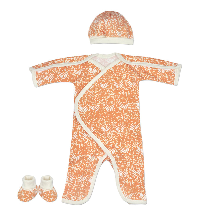 NICU Friendly Unisex Preemie Jumpsuit. Unique orange and ivory print. Easy Lay Down and Wrap Around Style, with Great Access for All NICU Needs. Velcro closures and matching cap and booties included.