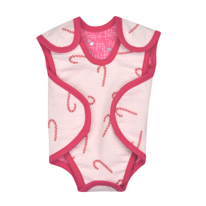 Preemie Girl's NICU Friendly Nic-Suit. Soft cotton flannel, with easy Velcro closures. Made from two separate pieces to provide the best access for NICU needs. Reversible for two different looks. One side is Red and Pink Candy Cane Print, and Pink Floral on The Other Side.
